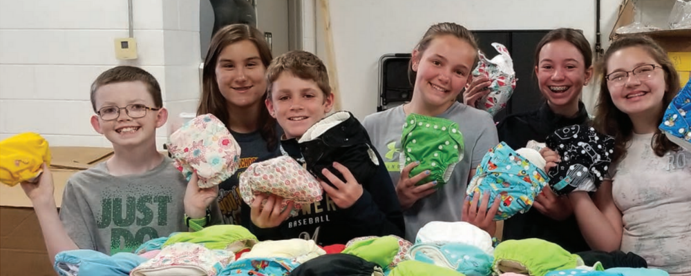 youth groups packing cloth diapers volunteering
